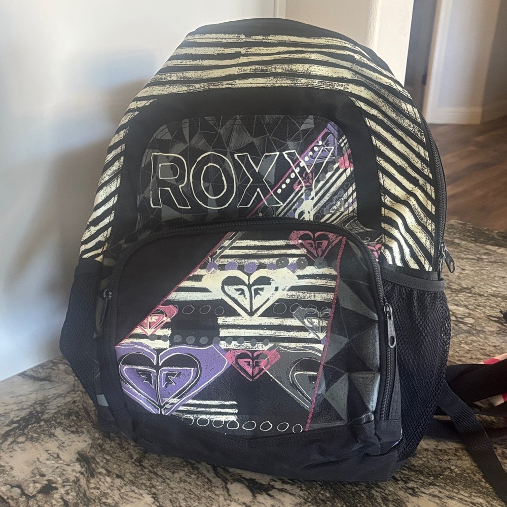 Roxy Black and Cream Backpack with Purple Accents